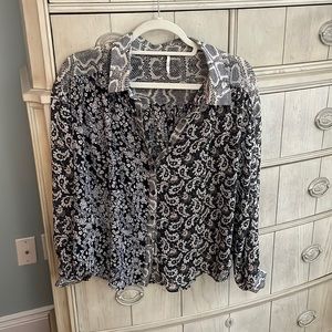 Beautiful Blouse from Free People perfect for any occasion!